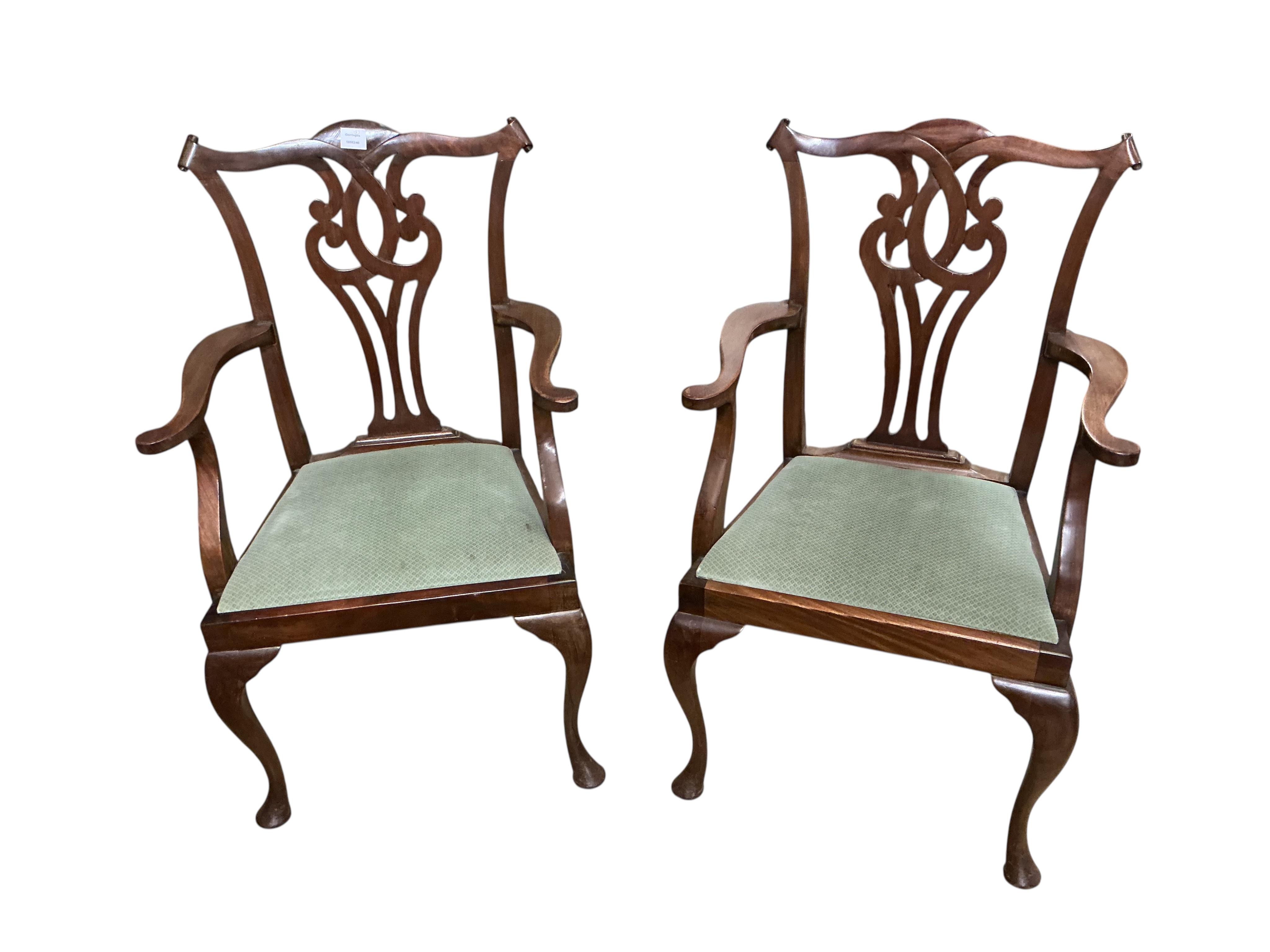 A set of eight George III style mahogany dining chairs, two with arms